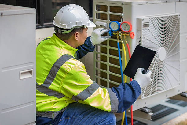 Professional Heat Pump Repair technician working in Norwood, NY
